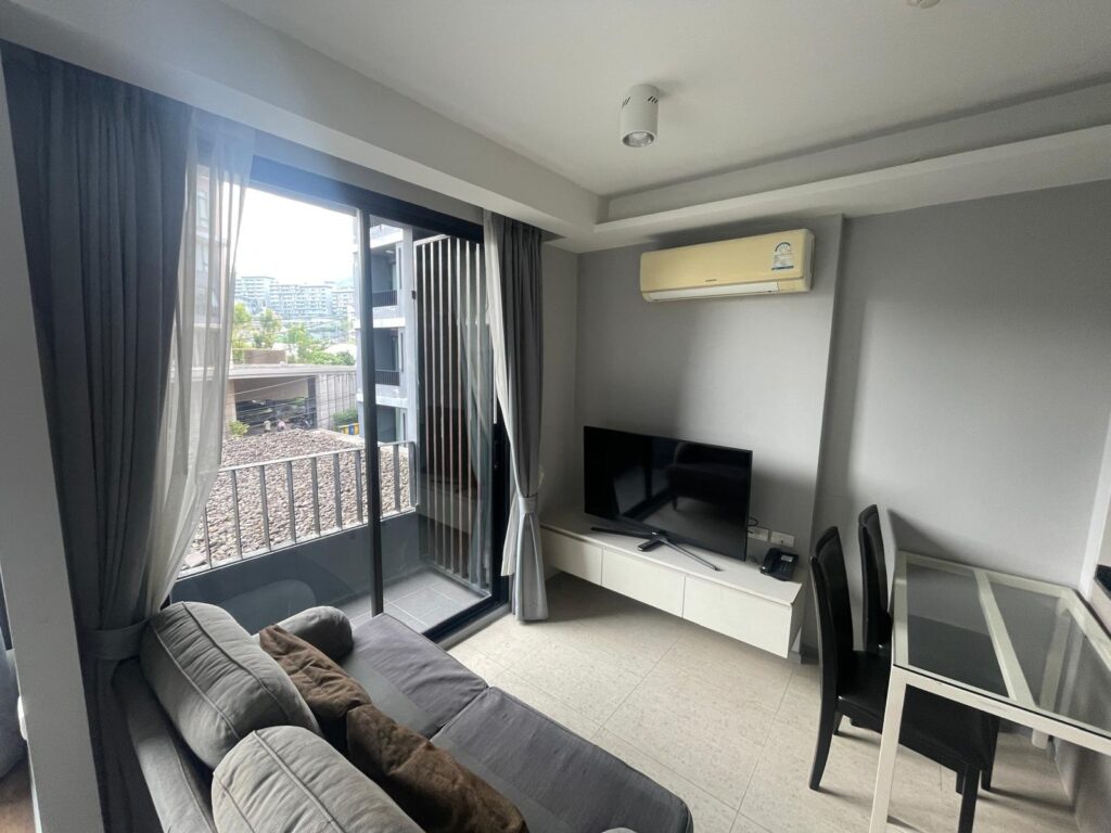 IMG-20250307-6Ave-321-2 Furnished studio with balcony doors, freehold condo in Surin Phuket