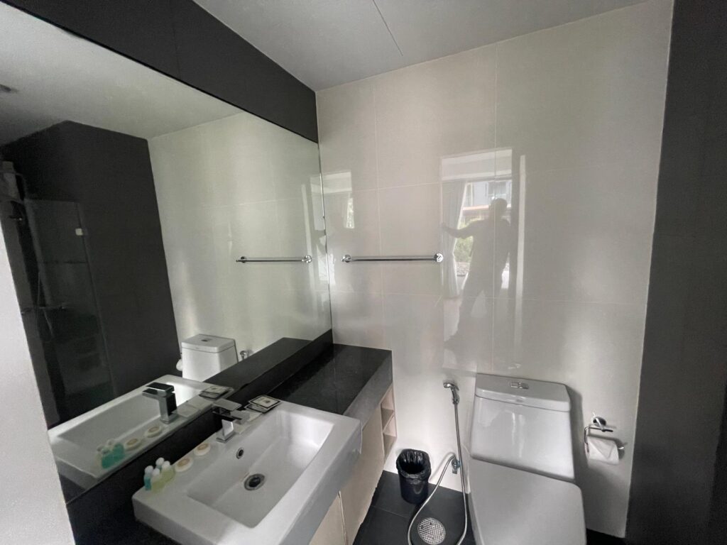 IMG-20250307-6Ave-321-6 Modern bathroom in studio unit for sale at 6th Avenue Surin
